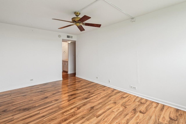 101 Bar Harbour Rd Unit 6N, Schaumburg, IL 60193 - empty room featuring wood finished floors, ceiling fan, and baseboards