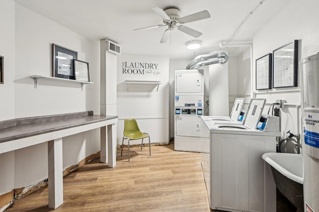 101 Bar Harbour Rd Unit 6N, Schaumburg, IL 60193 - shared laundry room featuring stacked washer / drying machine, washer and dryer, light wood-type flooring, ceiling fan, and water heater