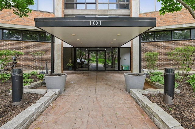 101 Bar Harbour Rd Unit 6N, Schaumburg, IL 60193 - view of exterior entry with brick siding and french doors