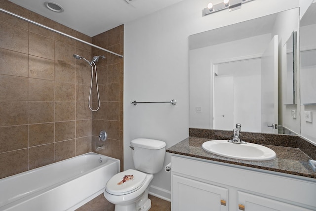 bathroom with toilet, vanity, and bathtub / shower combination