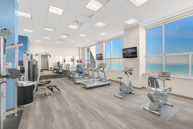 gym featuring carpet flooring and baseboards