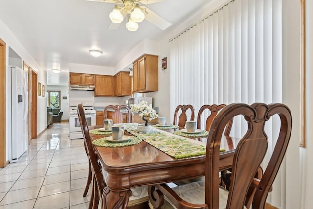 2740 W 35th Pl, Chicago, IL 60632 - dining space featuring ceiling fan and light tile patterned flooring