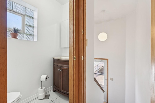 2740 W 35th Pl, Chicago, IL 60632 - bathroom featuring vanity, tile patterned floors, toilet, and baseboards