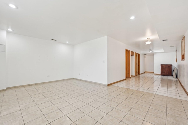 2740 W 35th Pl, Chicago, IL 60632 - empty room featuring recessed lighting, light tile patterned floors, and baseboards