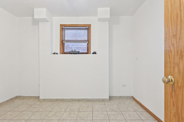 2740 W 35th Pl, Chicago, IL 60632 - unfurnished room featuring light tile patterned floors and baseboards