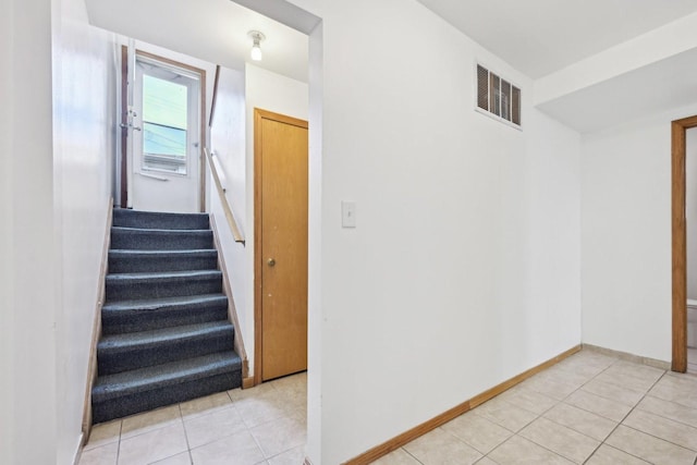 2740 W 35th Pl, Chicago, IL 60632 - stairs featuring tile patterned floors and baseboards