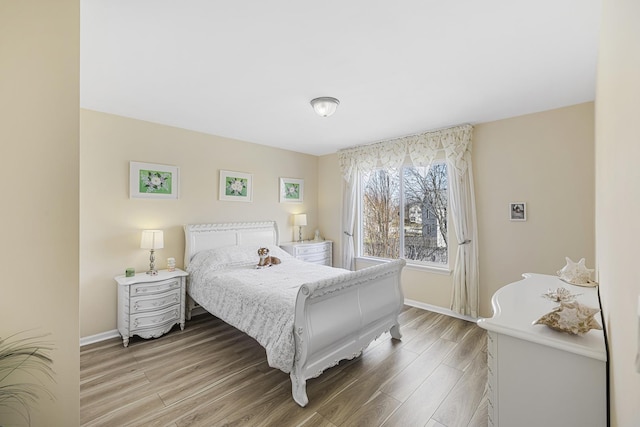536 W Caldwell Dr, Round Lake, IL 60073 - bedroom featuring baseboards and light wood-style flooring