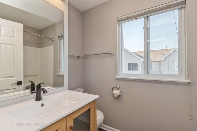 34309 N Goldenrod Rd, Round Lake, IL 60073 - full bath featuring toilet, vanity, and baseboards