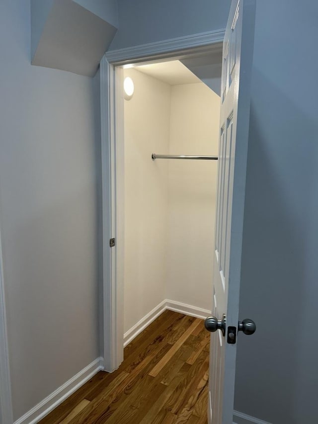 1122 N Mason Ave, Chicago, IL 60651 - walk in closet featuring dark wood-style flooring