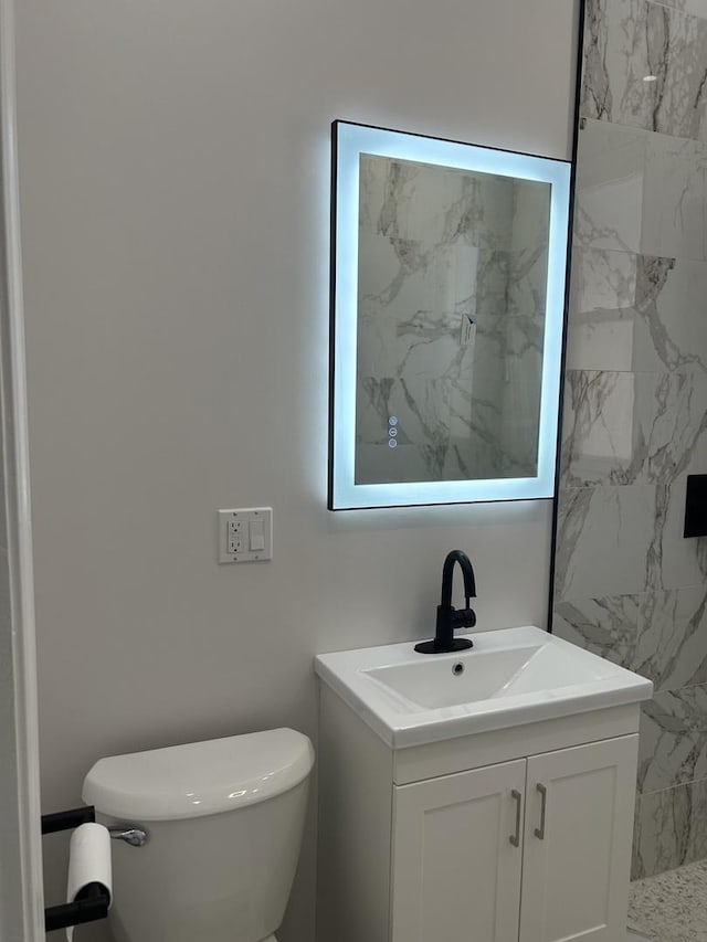 1122 N Mason Ave, Chicago, IL 60651 - full bathroom featuring vanity, toilet, and a shower