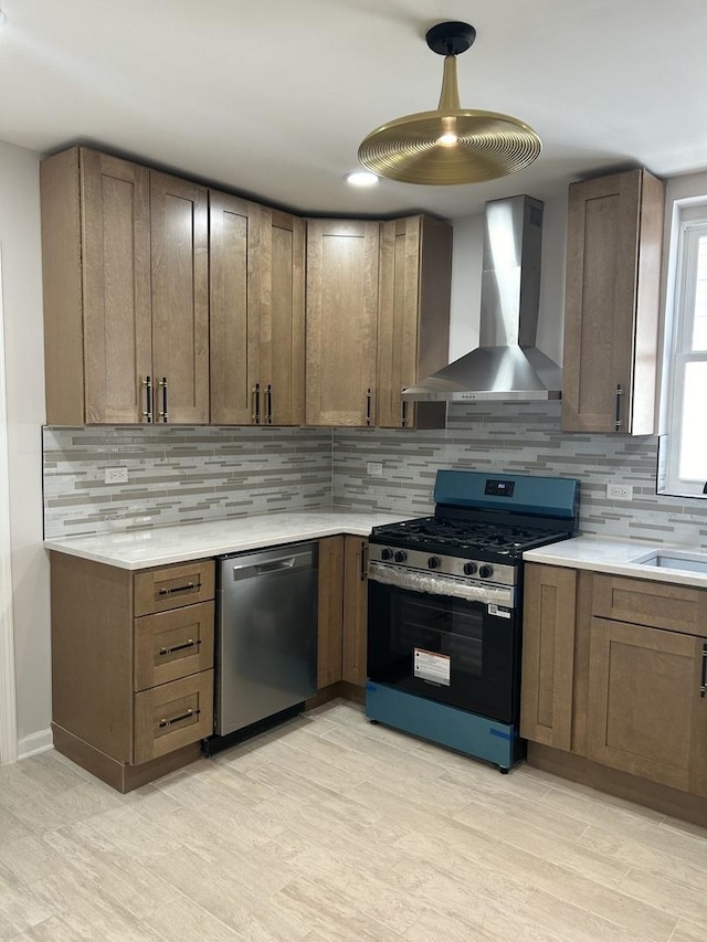 1122 N Mason Ave, Chicago, IL 60651 - kitchen featuring appliances with stainless steel finishes, wall chimney exhaust hood, a sink, and light countertops