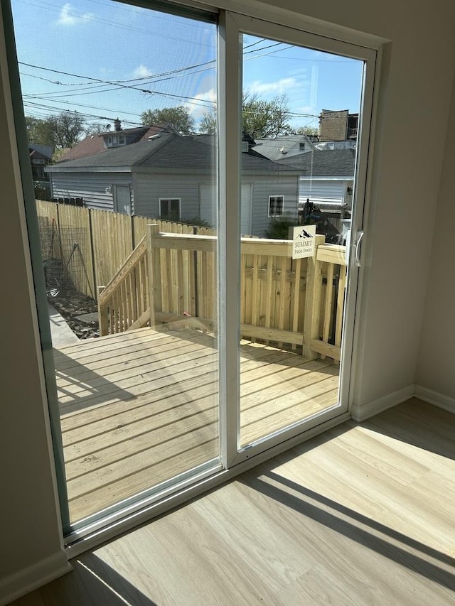 1122 N Mason Ave, Chicago, IL 60651 - entryway featuring wood finished floors and baseboards