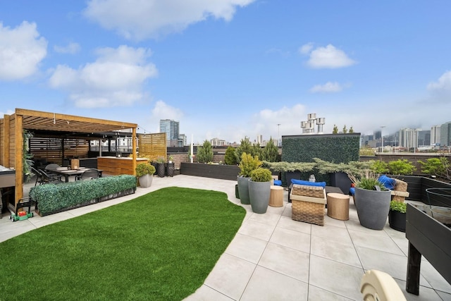 view of yard with outdoor dry bar, a patio area, and a city view