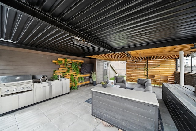 view of patio / terrace featuring area for grilling and an outdoor hangout area