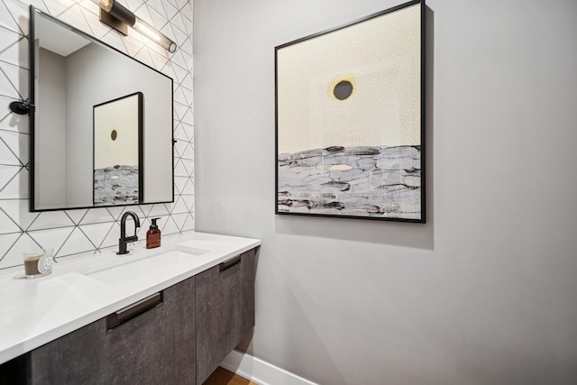bathroom featuring backsplash and vanity