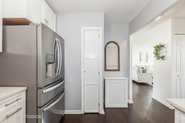 2000 Saint Regis Dr Unit 6F, Lombard, IL 60148 - kitchen featuring stainless steel fridge with ice dispenser, dark wood finished floors, light countertops, white cabinets, and baseboards