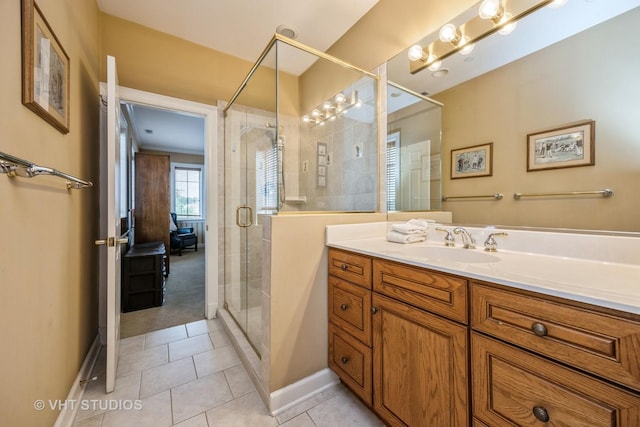 444 Ashland Ave Unit 5, River Forest, IL 60305 - bathroom featuring a shower stall, vanity, tile patterned floors, and baseboards