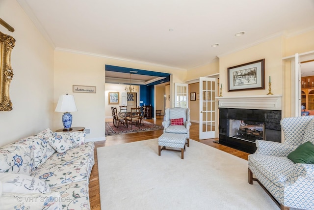 444 Ashland Ave Unit 5, River Forest, IL 60305 - living area featuring crown molding, wood finished floors, a multi sided fireplace, and baseboards