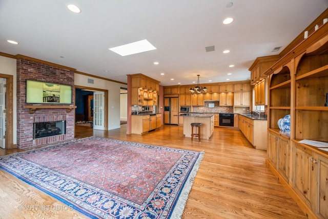 444 Ashland Ave Unit 5, River Forest, IL 60305 - kitchen featuring a chandelier, dark countertops, a sink, crown molding, and open floor plan