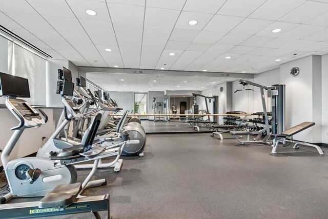 exercise room featuring recessed lighting