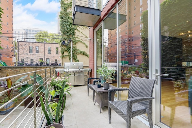 balcony featuring a grill