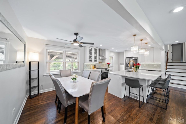 8S100 Washington St, Darien, IL 60561 - dining area with dark wood finished floors, baseboards, a ceiling fan, recessed lighting, and stairs