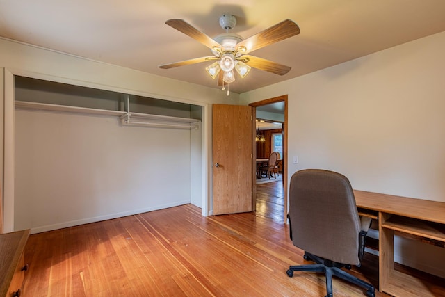 home office featuring ceiling fan and wood finished floors