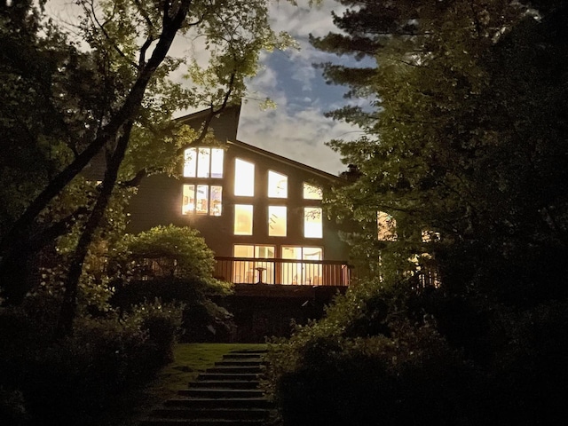 view of home's exterior with stairs