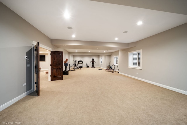 workout room featuring light carpet, baseboards, and recessed lighting