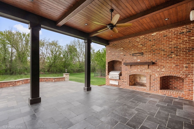 view of patio / terrace featuring area for grilling, a grill, and a ceiling fan
