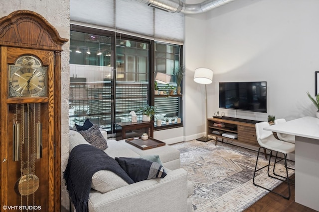 living room featuring baseboards