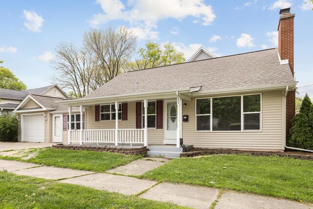 205 S 10th Ave, Saint Charles, IL 60174 - single story home featuring covered porch, an attached garage, a shingled roof, and a front lawn