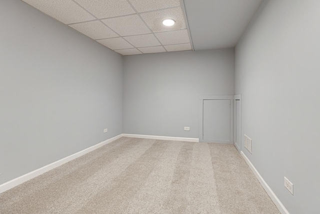 205 S 10th Ave, Saint Charles, IL 60174 - spare room featuring a paneled ceiling, carpet, and baseboards