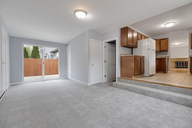 205 S 10th Ave, Saint Charles, IL 60174 - unfurnished living room featuring light carpet and baseboards