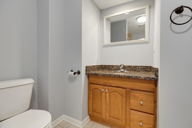205 S 10th Ave, Saint Charles, IL 60174 - half bath with toilet, vanity, tile patterned floors, and baseboards