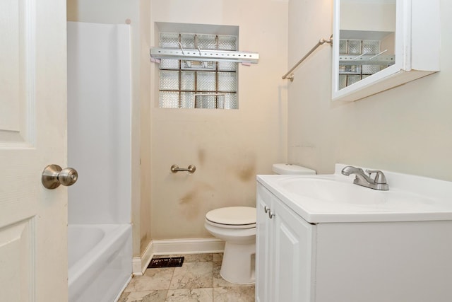 bathroom featuring toilet, vanity, a tub to relax in, baseboards, and a shower