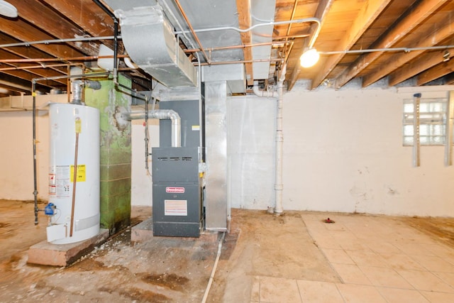 unfinished below grade area featuring water heater and heating unit