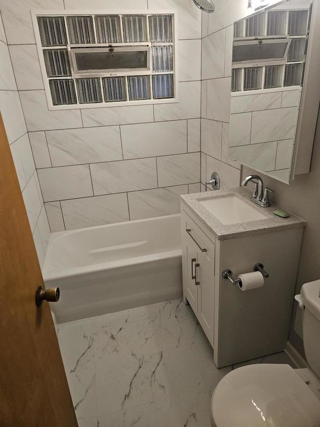 7202 W Crain St, Niles, IL 60714 - bathroom featuring bathing tub / shower combination, toilet, marble finish floor, and vanity