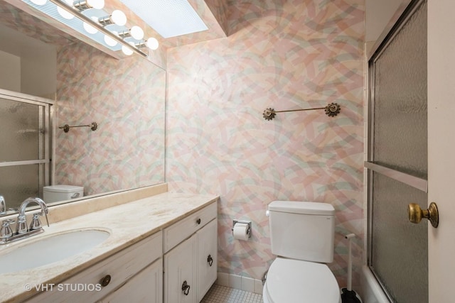 7061 N Kedzie Ave Unit 1504, Chicago, IL 60645 - bathroom with wallpapered walls, toilet, an enclosed shower, vanity, and tile patterned flooring