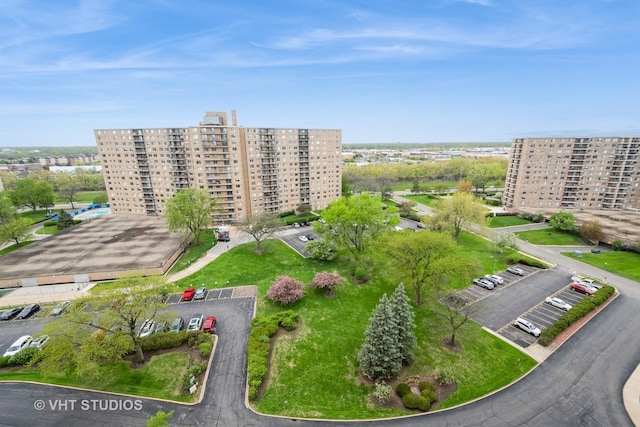 7061 N Kedzie Ave Unit 1504, Chicago, IL 60645 - aerial view of property and surrounding area featuring apartment complex / building and nearby urban area