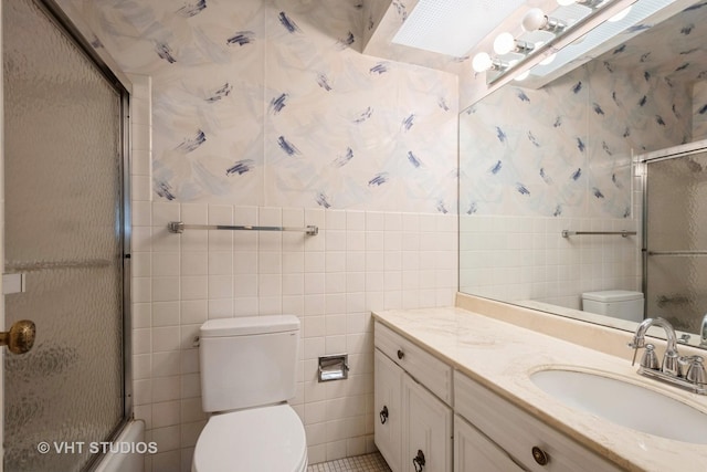 7061 N Kedzie Ave Unit 1504, Chicago, IL 60645 - bathroom featuring tile walls, toilet, wallpapered walls, and vanity
