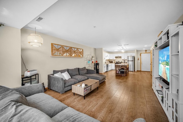 100 N Bokelman St Unit 430, Roselle, IL 60172 - living room featuring wood finished floors
