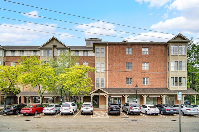 100 N Bokelman St Unit 430, Roselle, IL 60172 - view of building exterior with uncovered parking