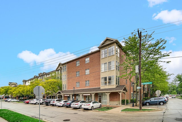 100 N Bokelman St Unit 430, Roselle, IL 60172 - view of building exterior with uncovered parking