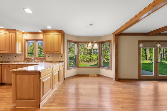 1624 Mirror Lake Dr, Naperville, IL 60563 - kitchen with plenty of natural light, baseboards, decorative backsplash, and recessed lighting
