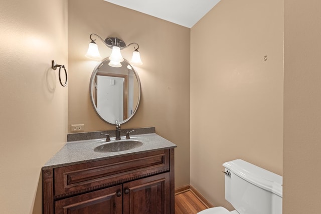 1624 Mirror Lake Dr, Naperville, IL 60563 - half bathroom with vanity, wood finished floors, and toilet