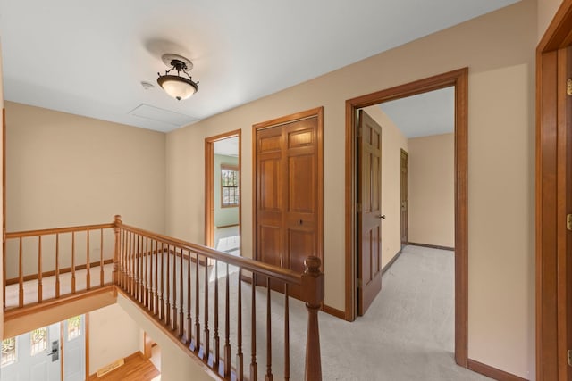 1624 Mirror Lake Dr, Naperville, IL 60563 - hall featuring an upstairs landing, light colored carpet, and baseboards