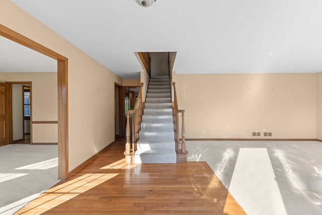 1624 Mirror Lake Dr, Naperville, IL 60563 - stairs with wood finished floors and baseboards