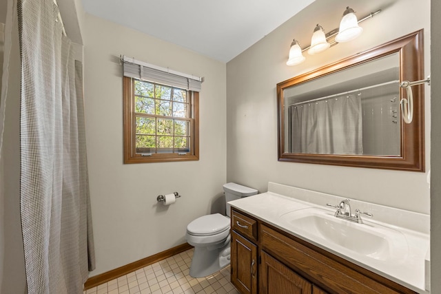 1624 Mirror Lake Dr, Naperville, IL 60563 - bathroom featuring baseboards, toilet, vanity, tile patterned flooring, and a shower with curtain