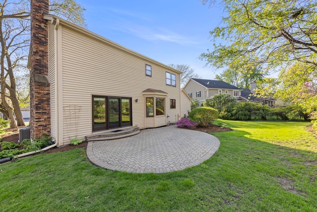 1624 Mirror Lake Dr, Naperville, IL 60563 - rear view of property featuring a patio, a chimney, and a lawn